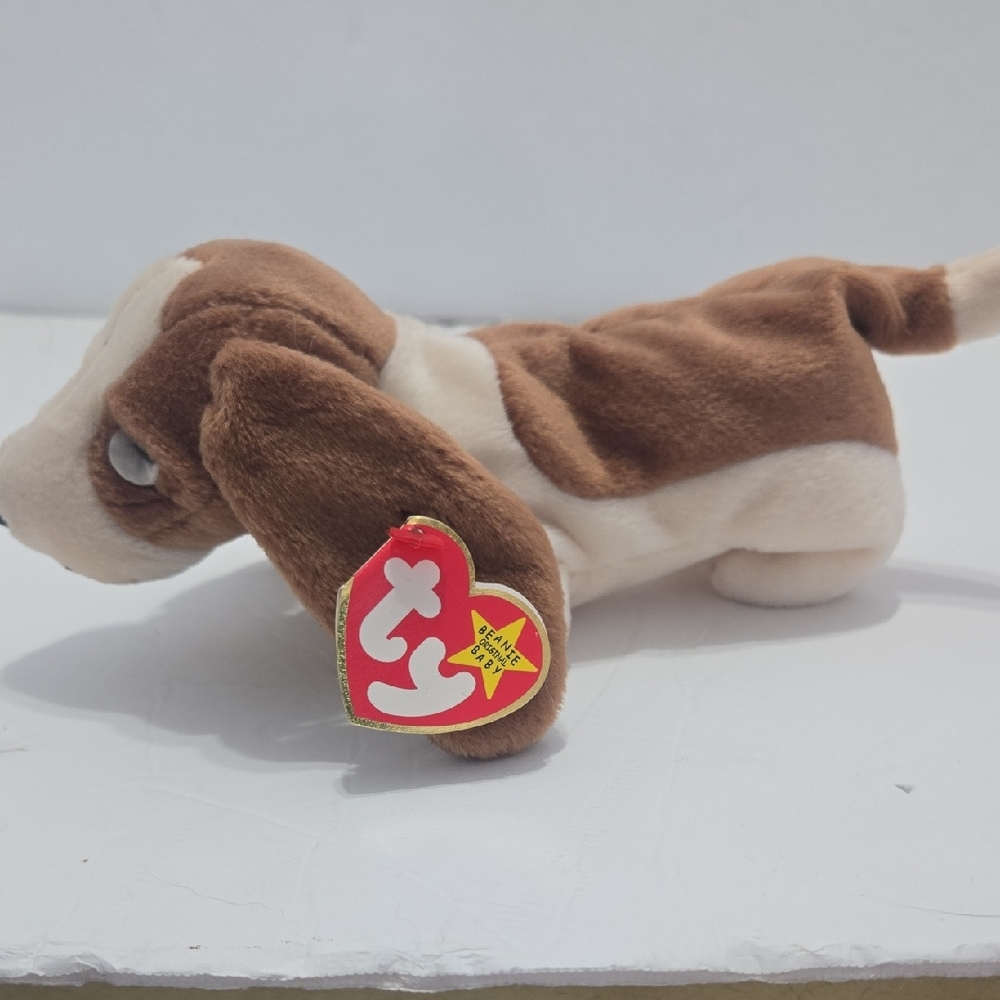 Brown and White Plush Dog Toy